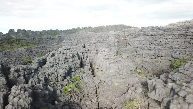 aerial drone footage of unique tsingy limestonerock formations of nosy hara / madagascar