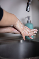 Corona virus travel prevention wash hands with soap and hot water. Hand hygiene for coronavirus outbreak. Protection by washing hands frequently