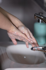 Corona virus travel prevention wash hands with soap and hot water. Hand hygiene for coronavirus outbreak. Protection by washing hands frequently