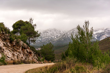 Penteli mountain with peak covered in snow