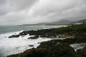 Fototapeta na wymiar Storm view of the coast landscape of Kenting