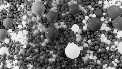 beautiful shiny balls of different shades of gray and sizes completely cover surface. Some spheres glow. 3d photorealistic render geometric holiday background of shiny balls