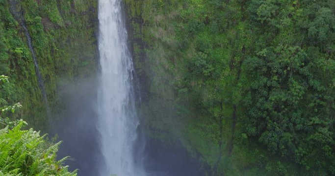Hawaii Akaka Falls - Hawaiian waterfall on Big Island, Hawaii, USA. Beautiful pristine nature landscape scene showing the famous waterfall, Akaka falls in lush scenery. RED EPIC SLOW MOTION.