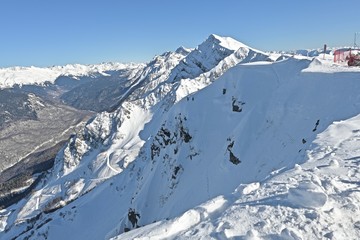 Fototapeta na wymiar snow-capped mountain peaks in a ski resort
