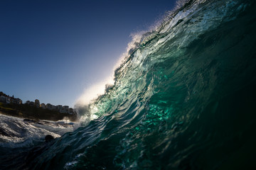 Fototapeta na wymiar Splashing waves at sunrise, Sydney Australia