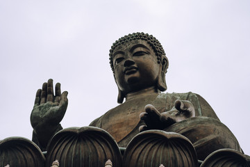Tian Tan Buddha up close details with white sky