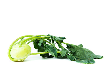 Kohlrabi on a white background. Eating vegetables and healthy nutrition. Consuming kohlrabi, adding to various dishes, diversifying your food.