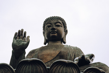 Tian Tan Buddha up close details with white sky