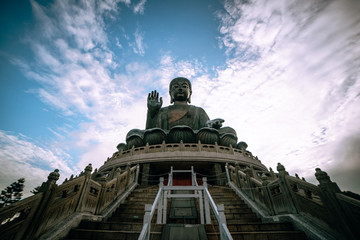 Tian Tan Buddha in Hong Kong with cloudy sky