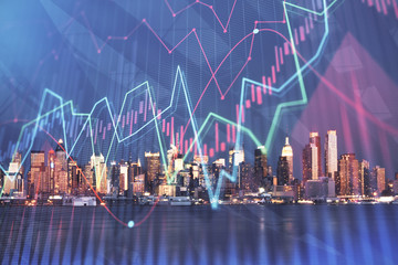 Financial graph on night city scape with tall buildings background double exposure. Analysis concept.