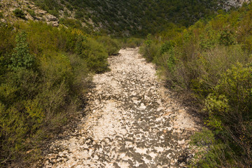 Dry riverbed in hot summer. Knin in Croatia.