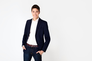 Handsome teenage boy in elegant clothes.