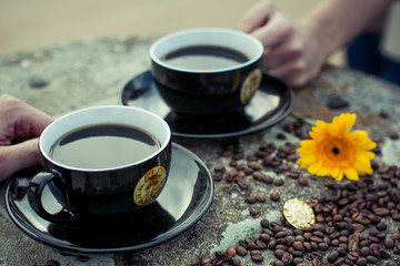 cup of coffee with beans