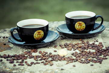 Couple cup of coffee with beans