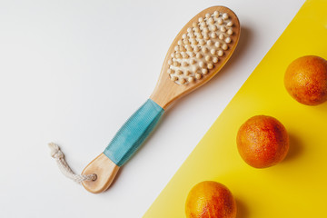 Anti-cellulite massage brush on a white background. Orange peel cellulite concept. Lymphatic drainage massage. Place for text. organic cactus brush