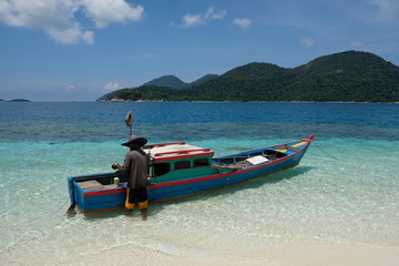 Anambas Islands Indonesia - traditional fishing boat in shallow water