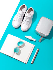 Organised set of white female accessories.