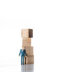 Miniature people: small figures with word block