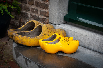 Two pairs of wooden shoes - klompen or clogs. Traditional dutch footwear