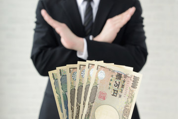 賄賂を拒むビジネスマン