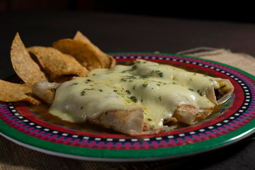 Enchiladas tortillas with nachos and cheese
