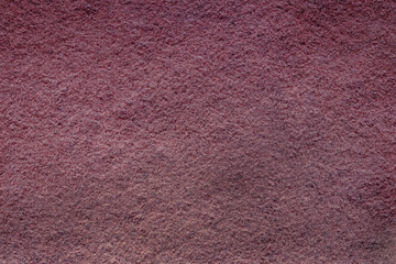 Abstract background with brown texture, velvet fabric, close-up. Colorful felt texture for background with copy space. Felt fabric sheet