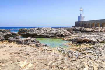 Scogli e acqua con faro - Otranto - Salento