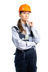 Female construction engineer with dollars in her pocket with a serious look. isolated