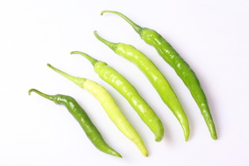 green peppers on white background