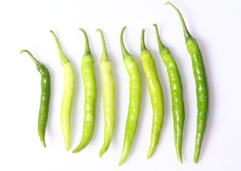 green peppers on white background