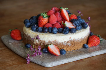 Cheesecake topped with berries