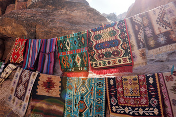Colorful fabrics and carpets for sale