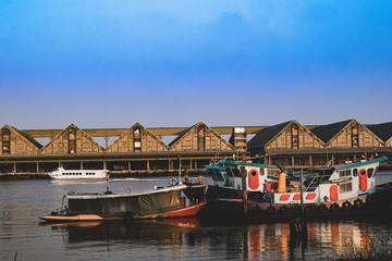 Fishing boats moored in the river.