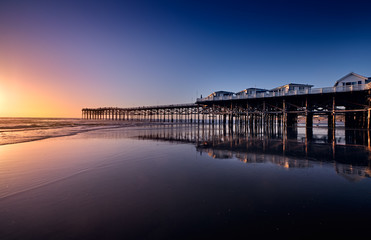 View North along Pacific Beach from Crystal Pier as the sun sets