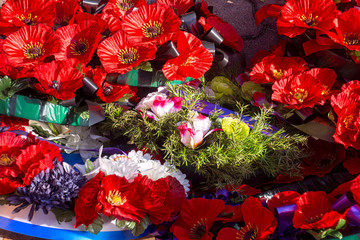 Red poppy wreaths at Anzac memorial