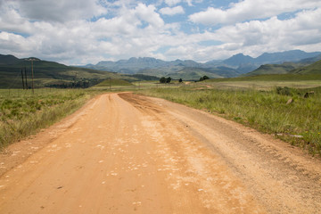 Fototapeta na wymiar Dirt Road Leading into the Mountains