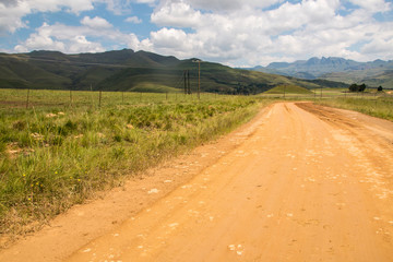 Fototapeta na wymiar Dirt Road Leading into the Mountains