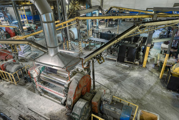 Interior of a factory for manufacturing rubber conveyor belts.