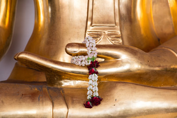 Fototapeta na wymiar Hand detail of Golden Buddha statue