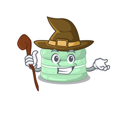 a mascot concept of pistachio macaron performed as a witch