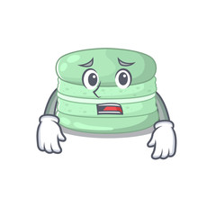 A picture of pistachio macaron having an afraid face