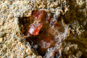 Czech garnet crystals macro view.