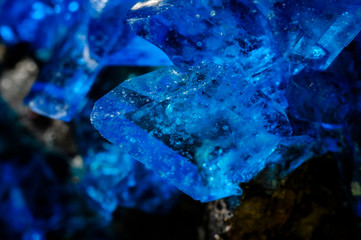 Crystals of blue vitriol in macro view.