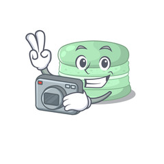 Cool Photographer pistachio macaron character with a camera