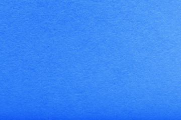 classic blue paper surface. bright blue sea clean background. High quality, copy space.