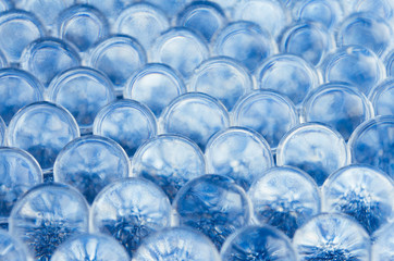 Abstract research background with transparent blue cells on sparkling backdrop, tissue, texture,...
