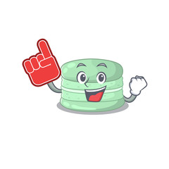 A picture of pistachio macaron mascot cartoon design holding a Foam finger