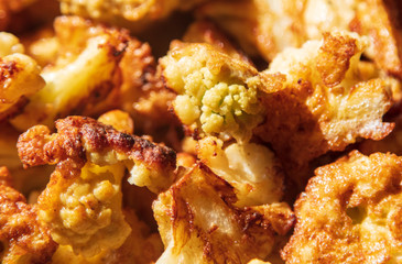 Fried cauliflower in egg batter.