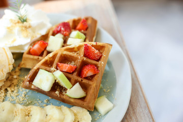 Waffle of fresh berries  strawberry, blueberry, bananas and chocolate topping,Sweet dessert cafe