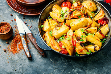 Roasted potato in a frying pan
